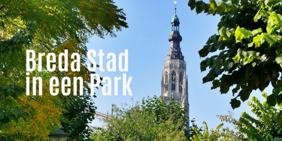 Groene stadsomgeving in Breda met zicht op de Grote Kerk, symbool van de stad als National Park City